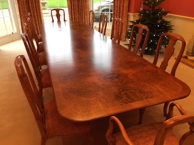 Walnut veneered dining table